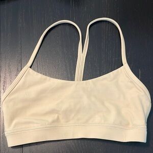 Lululemon Flow Y sports bra. Great neutral color and very gently worn!